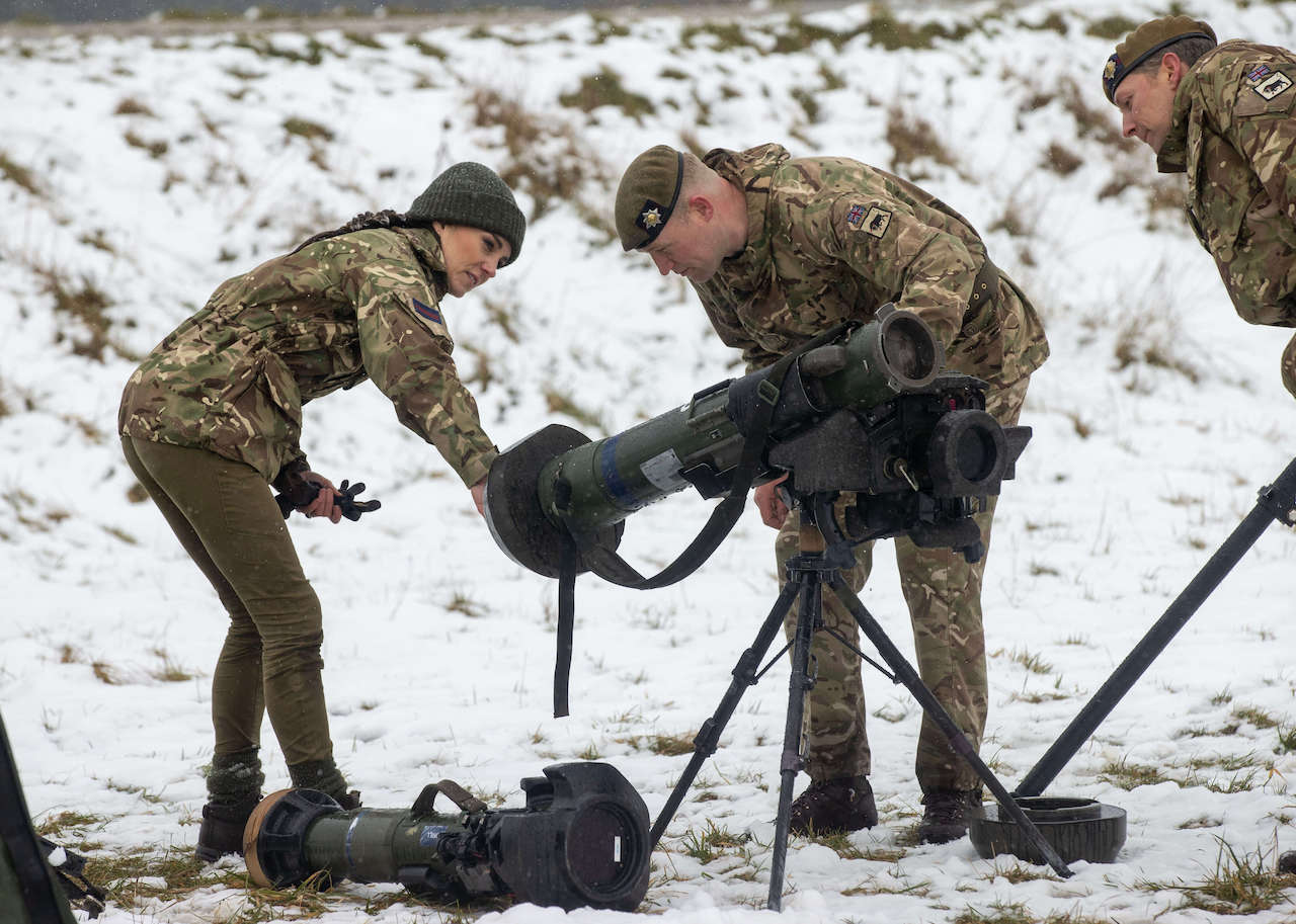 Kate Middleton, Princess of Wales, meets personnel on exercise during her visit to the Irish Guards on Salisbury Plain, on March 8, 2023, in Salisbury, England.