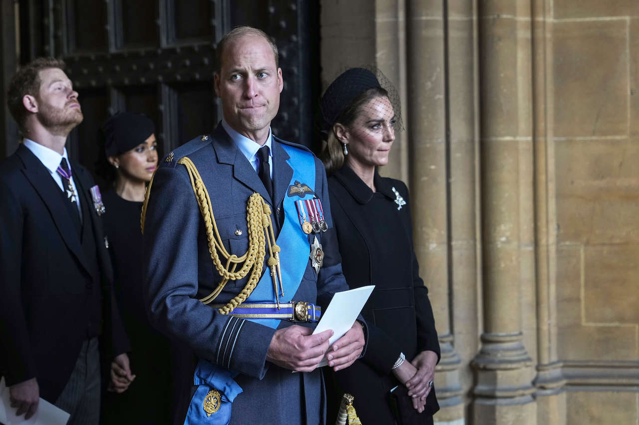 Prince William and Kate Middleton, followed by Prince Harry and Meghan Markle, leaving after escorting the coffin of Queen Elizabeth II to Westminster Hall from Buckingham Palace for her lying in state in 2022.