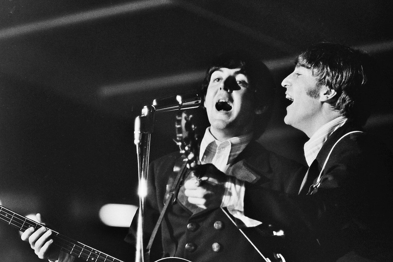 Paul McCartney and John Lennon performing with The Beatles during a U.S. tour in 1966.