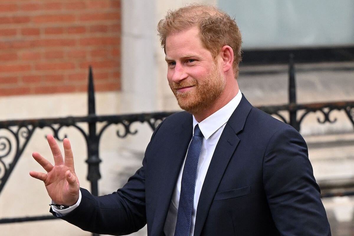 Prince Harry, whose body language sign of anxiety hinted at confidence in surprise London court appearance, waves