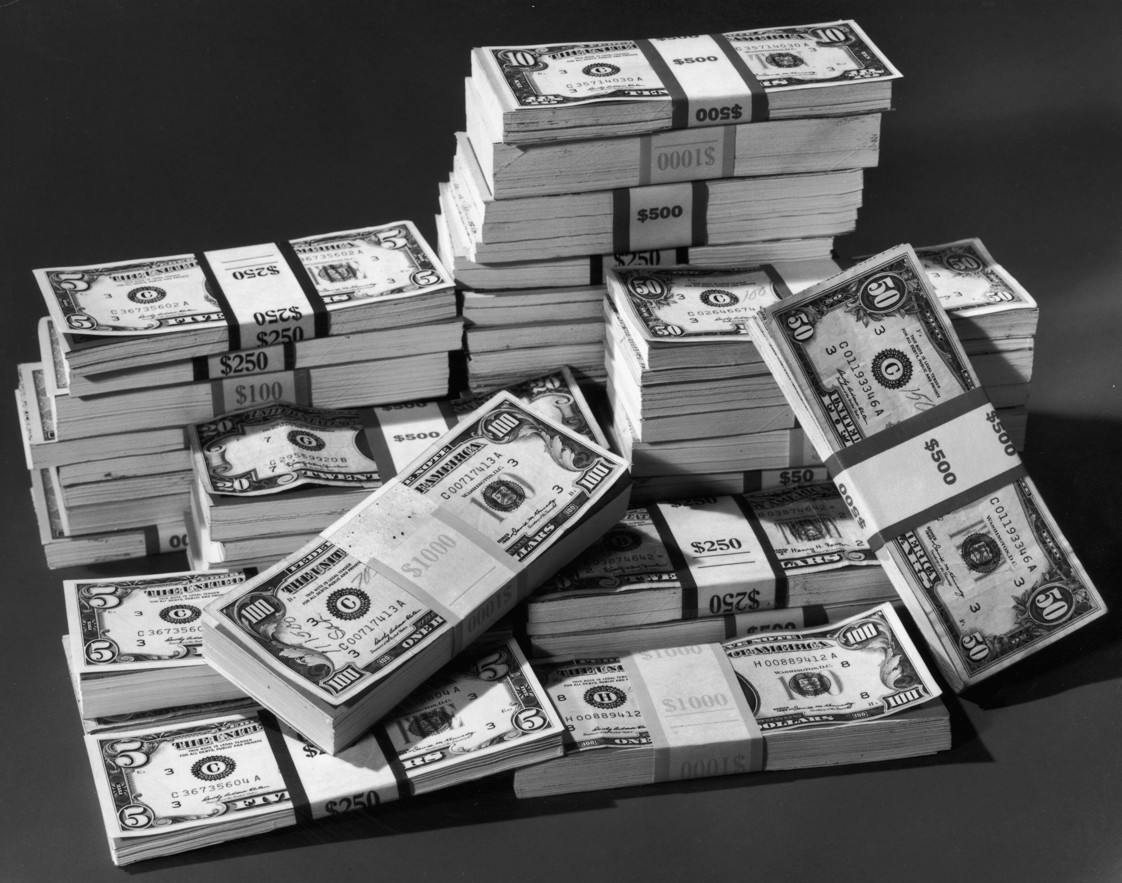 Piles of money in black-and-white