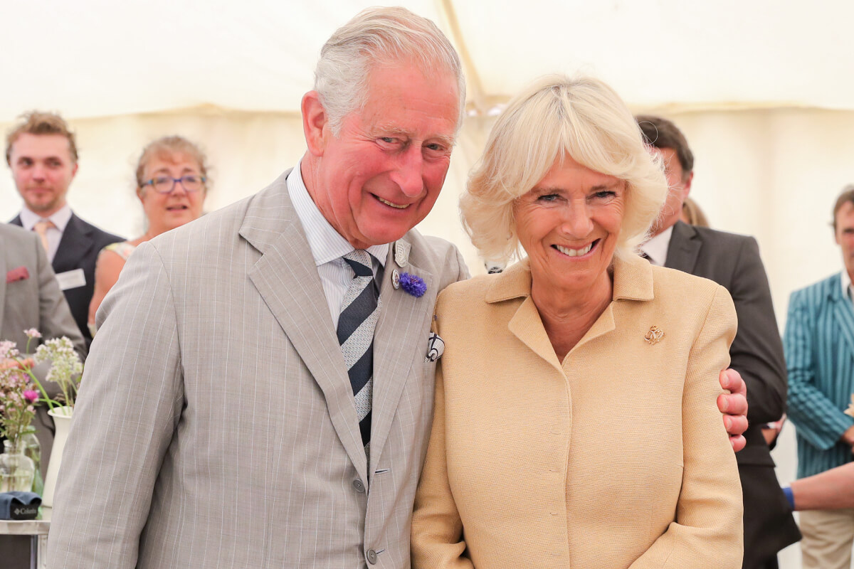 Queen Consort, Camilla Parker Bowles, then the Duchess of Cornwall is sung Happy Birthday by King Charles, then the Prince of Wales and the crowds gathered at the National Parks ‘Big Picnic’ celebration in honour of all 15 of the UK’s National Parks, during an official visit to Devon & Cornwall on July 17, 2019 in Simonsbath, England