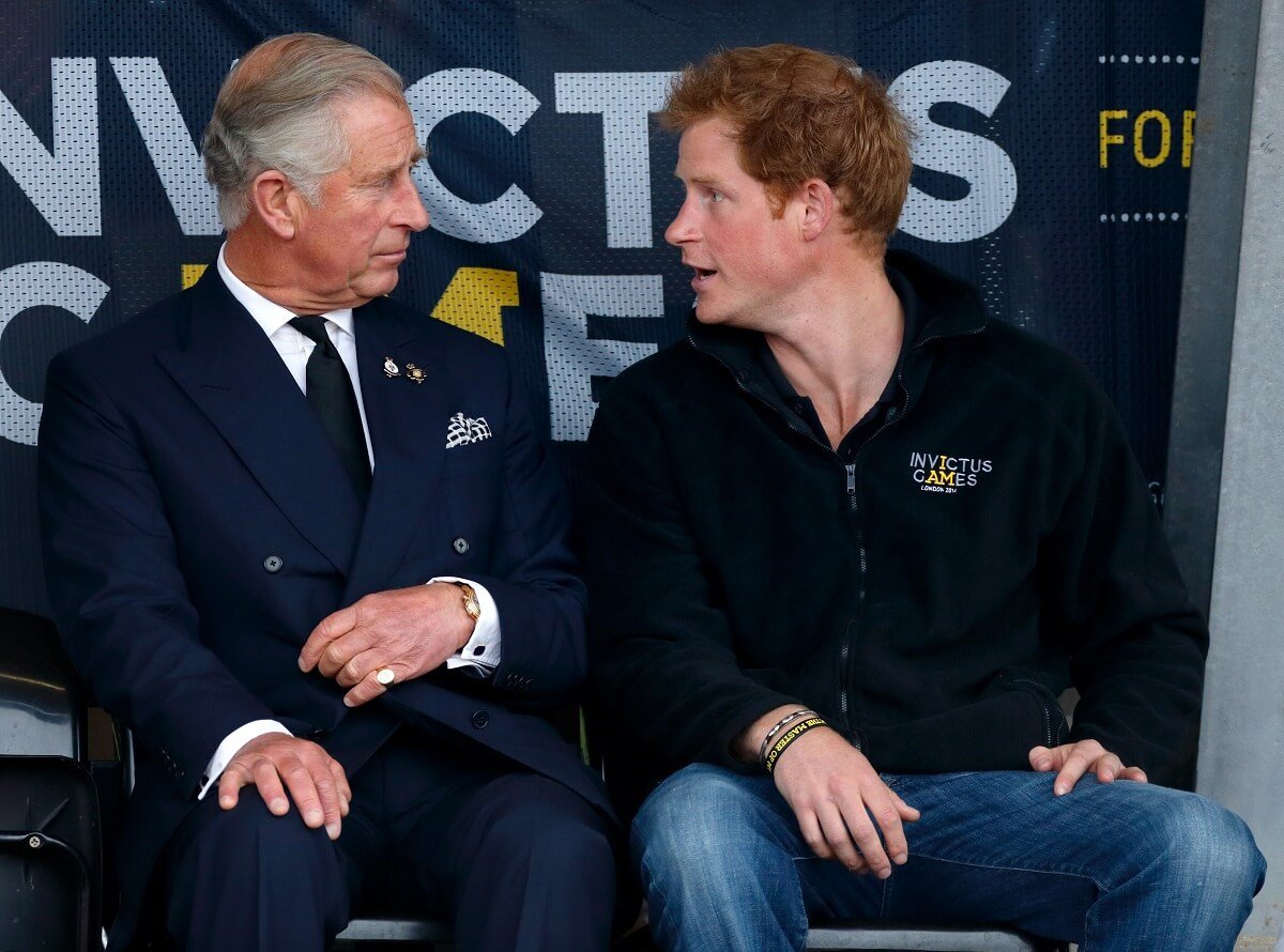 King Charles and Prince Harry, who is believed to have tried to outsmart his father during a recent trip to the U.K., at the Invictus Games together