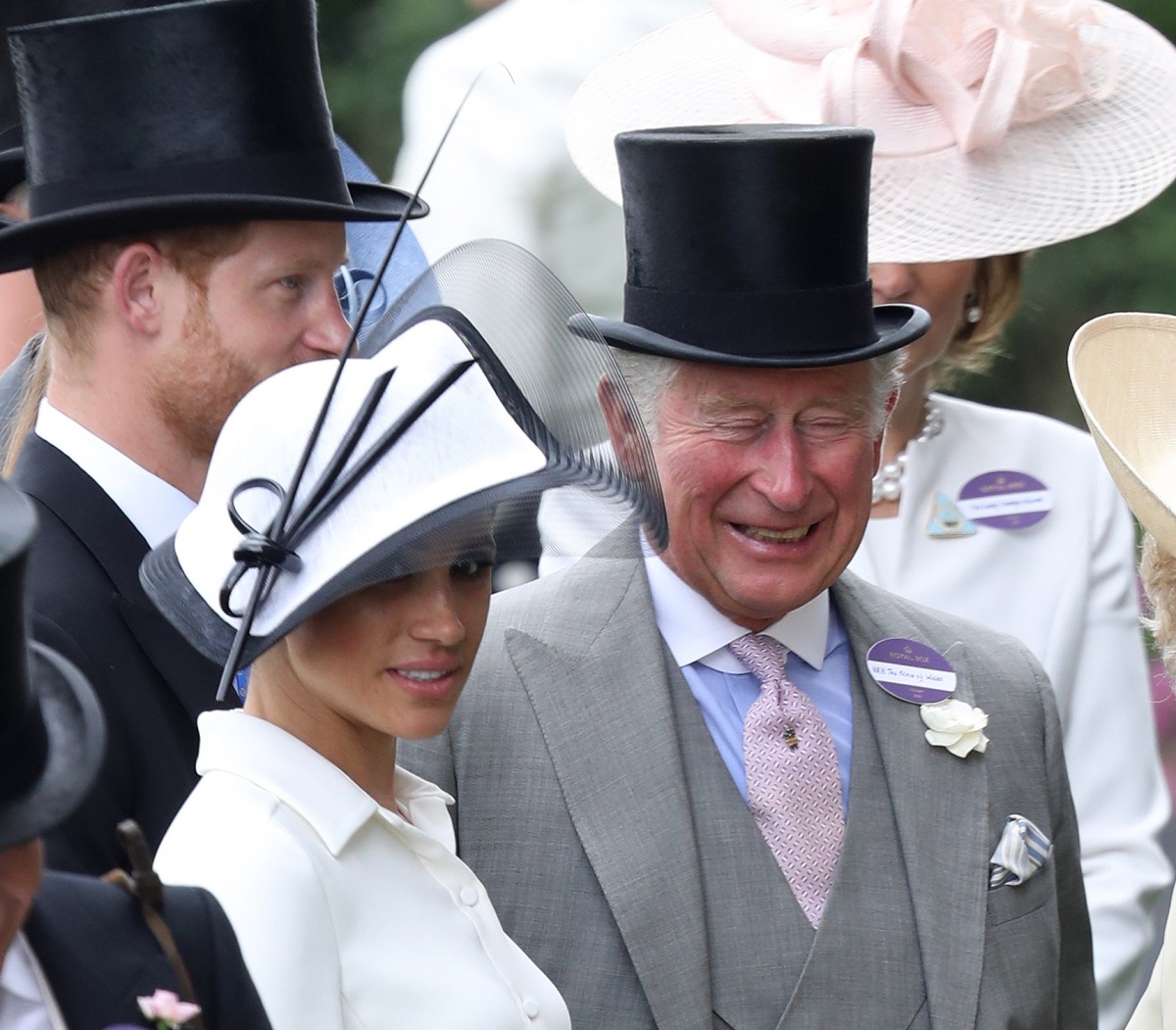 Prince Harry, Meghan Markle, and now-King Charles at Ascot Racecourse together in 2018