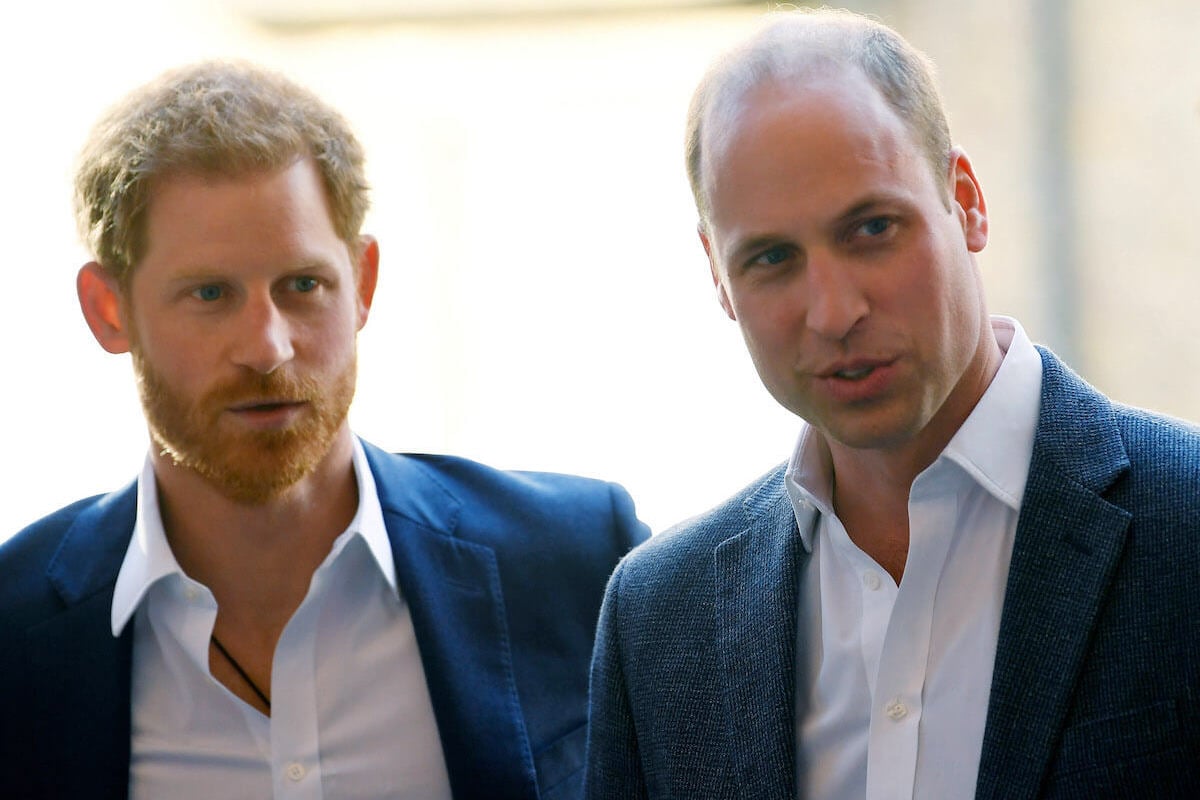 Prince Harry and Prince William, who was 'upset' about not getting Easter presents from Prince Harry and Meghan Markle, look on