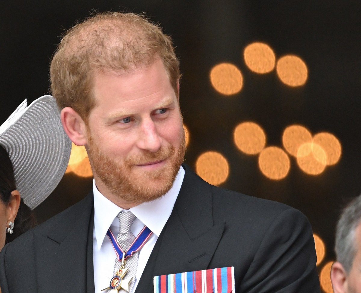 Prince Harry, who a biographer says is going to King Charles' coronation because of a "royal gene,"  at the National Service of Thanksgiving for Queen Elizabeth II's reign