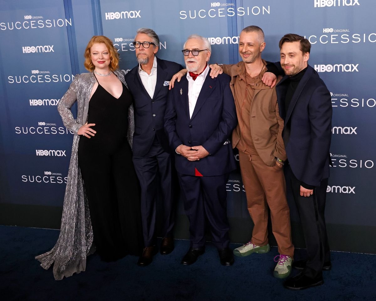 The cast of "Succession" pose for a photo.