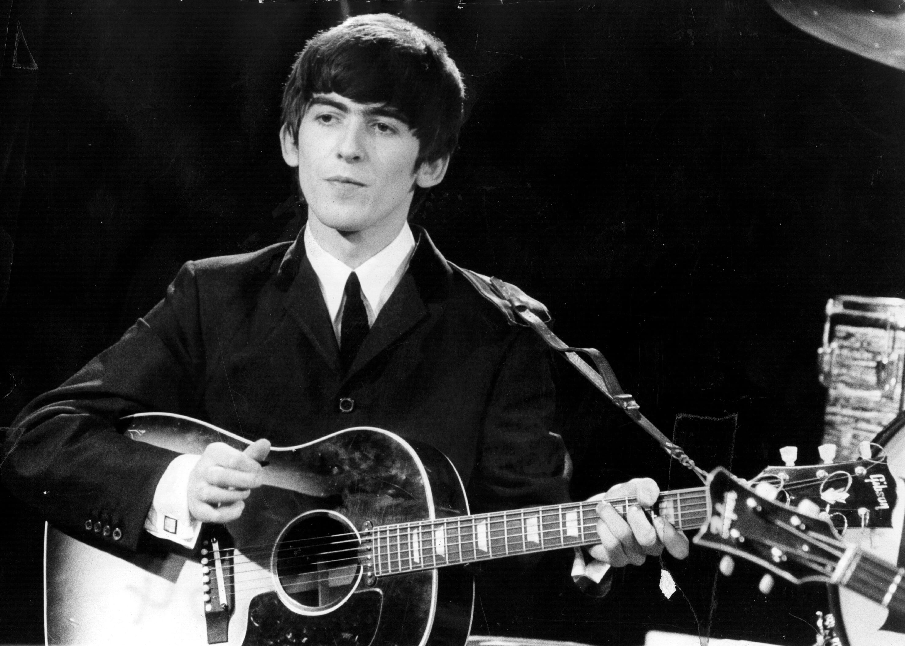 The Beatles' George Harrison in a suit