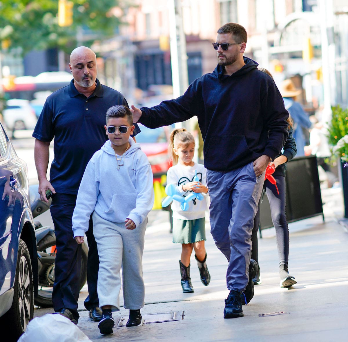 Mason with Scott and Penelope Disick in New York in 2018.