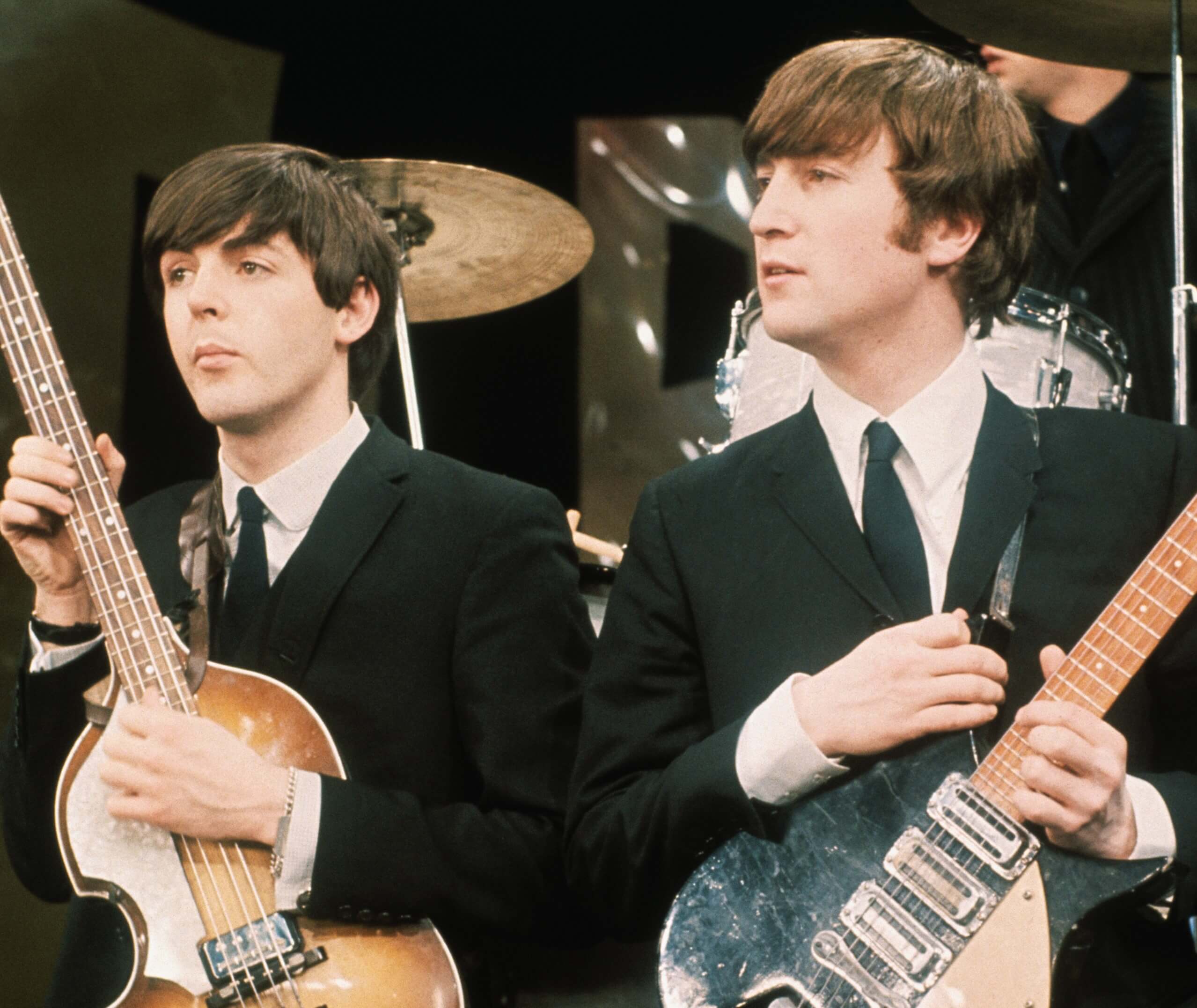 Paul McCartney and John Lennon with guitars