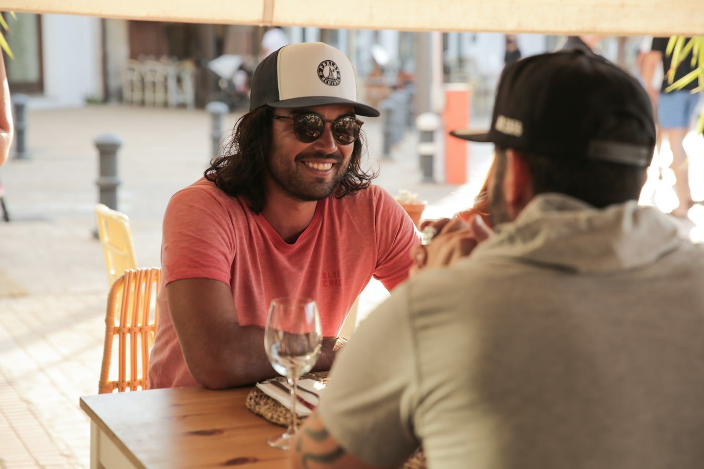 Colin MacRae from 'Below Deck Sailing Yacht' smiles at dinner