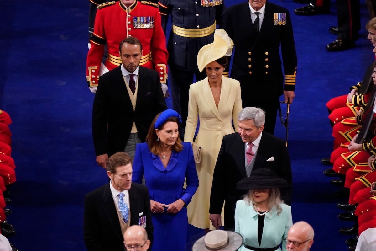 James Middleton, Pippa Middleton, Carole Middleton, and Michael Middleton, in what a royal expert called a display of Kate Middleton's 'growing influence,' walk to their seats at the coronation