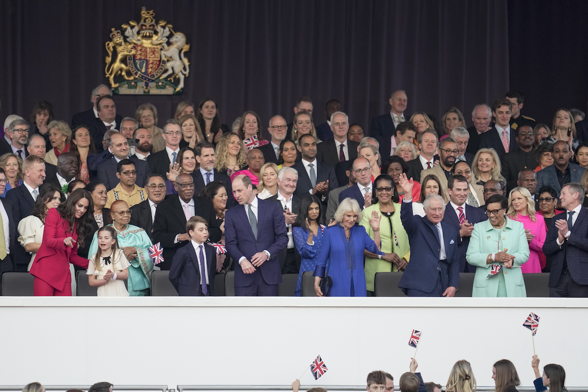 Kate Middleton, who showed her 'growing power' in the royal family with her parents and siblings attending the coronation, stands with Princess Charlotte, Prince George, Prince William, Queen Camilla, and King Charles III