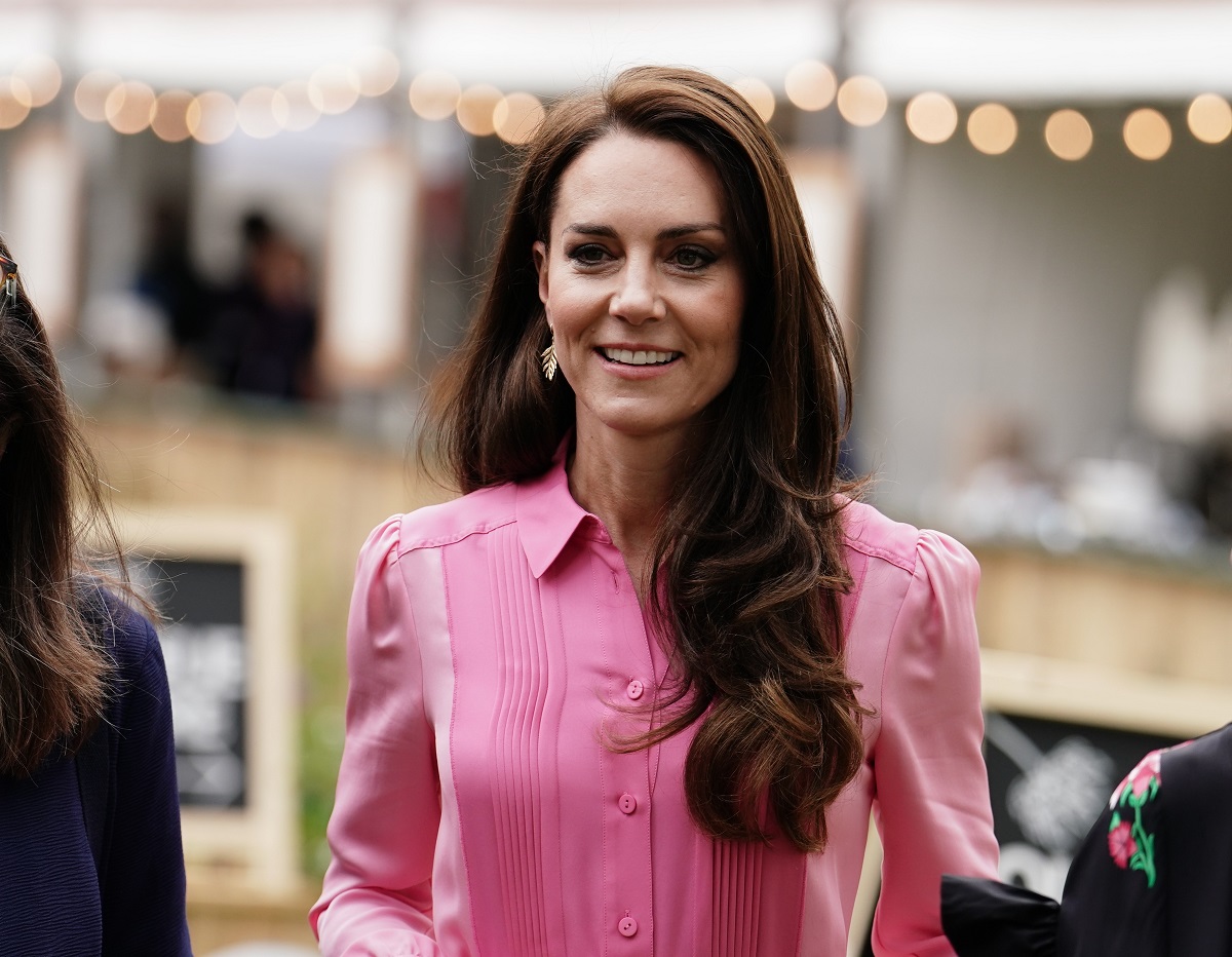 Kate Middleton, who may referenced Prince Harry and Meghan with answer about what royals do, looks on after taking part in the first Children's Picnic at the Chelsea Flower Show