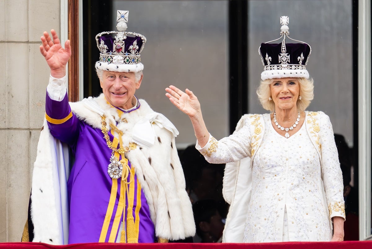 King Charles III and Camilla Parker Bowles (now- Queen Camilla) appear on the balcony of Buckingham Palace following their Coronation