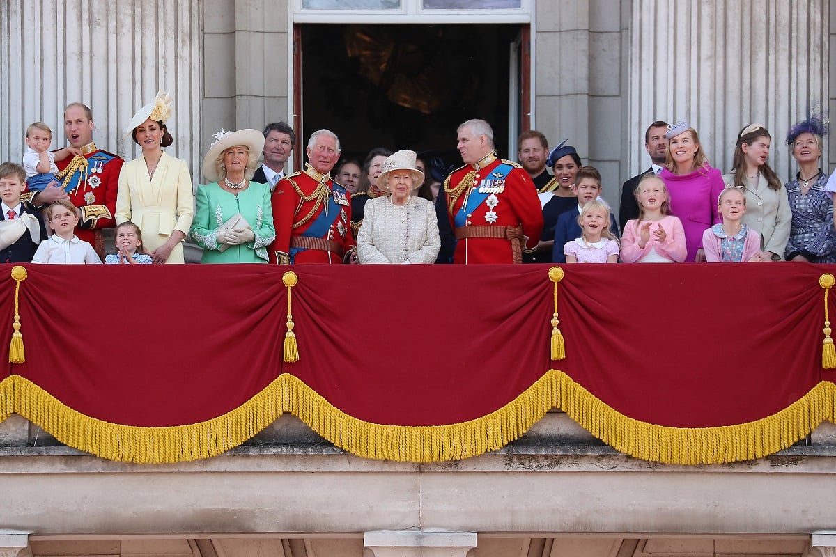 Members of the royal family, including Prince Harry, standing on the balcony of Buckingham Palace during Trooping The Colour 2019