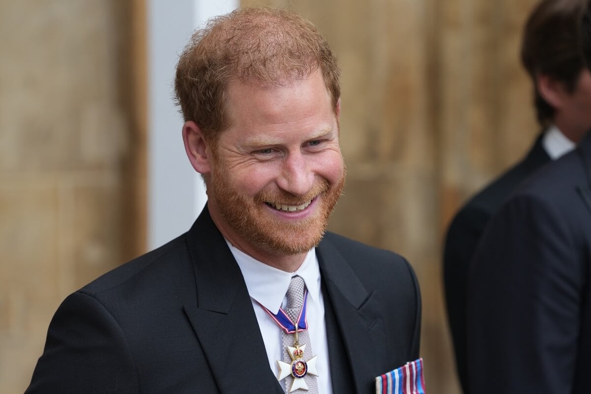 Prince Harry, who a body language expert thinks is genuinely happy in Los Angeles, leaves the Coronation of King Charles III