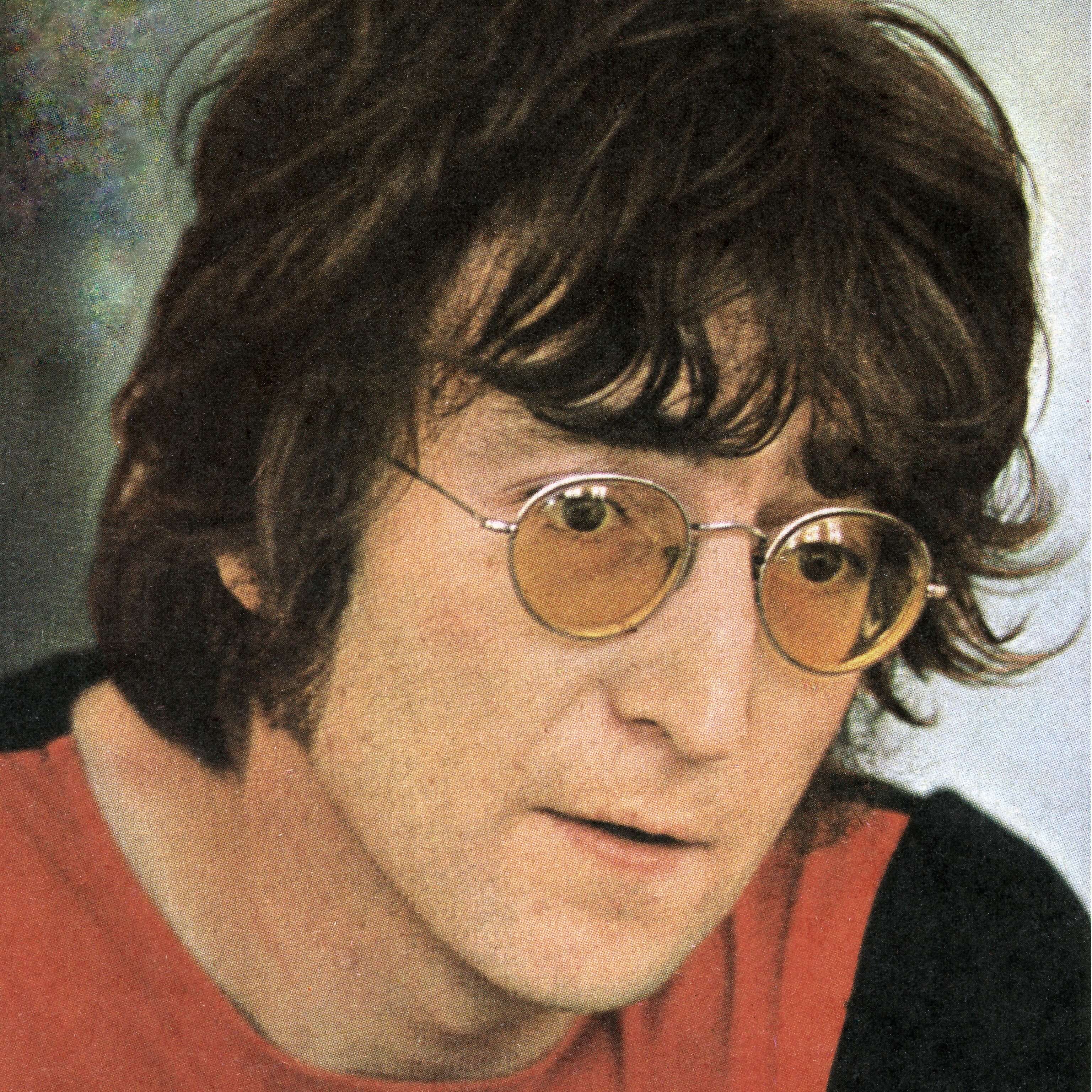 "Imagine" singer John Lennon in a red shirt