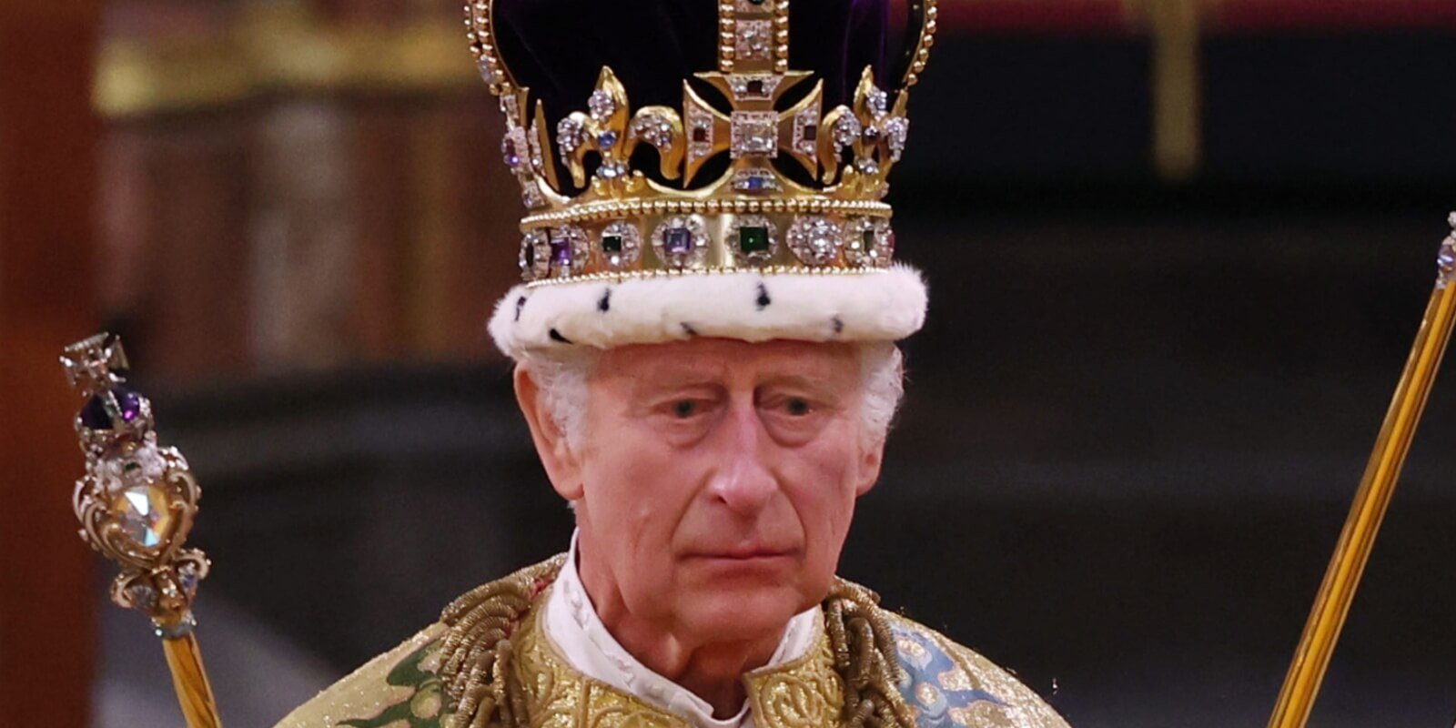 King Charles at his coronation ceremony which demonstrated the royal family's immense wealth.