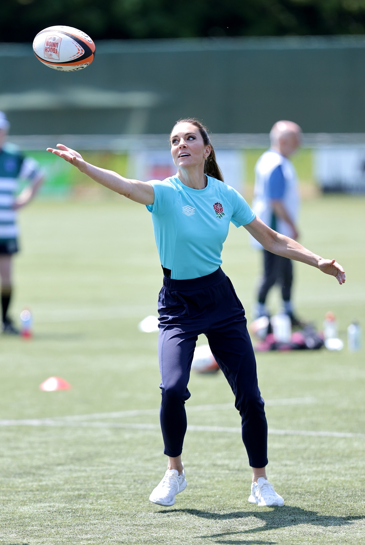 Kate Middleton takes part in drills during her visit to Maidenhead Rugby Club