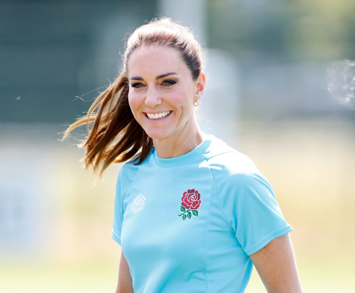 Kate Middleton, whose body language was analyzed at Maidenhead Rugby Club, takes part in a game of walking touch rugby