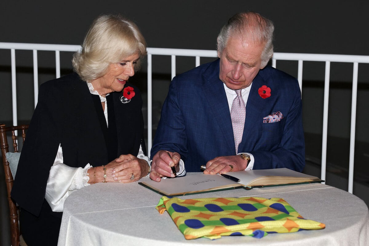 Queen Camilla, whose 'great strength' is knowing 'how to deal' with 'cross' King Charles, sits next to King Charles