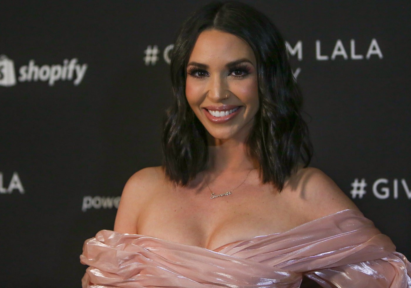 Scheana Shay from Vanderpump Rules smiles on the red carpet