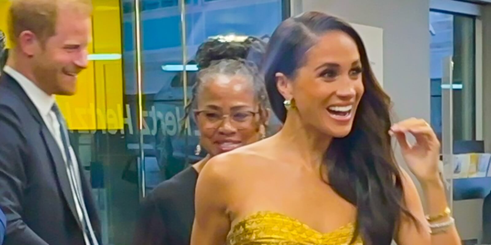 Prince Harry walks behind Meghan Markle and her mother Doria Ragland in May 2023 after a New York City event.