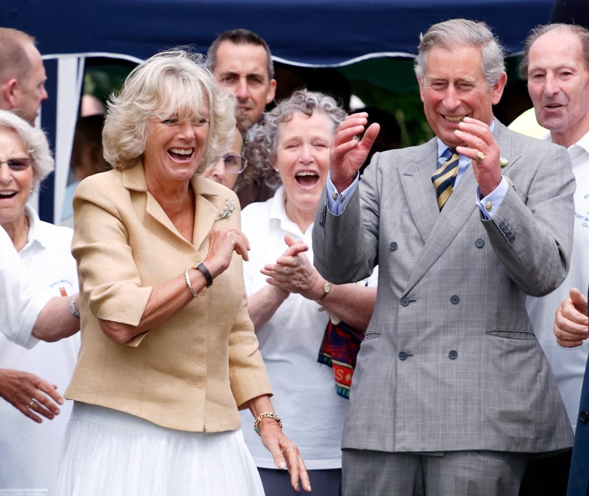 Camilla Parker Bowles and King Charles playing bowls during a visit to the Wiltshire village of Bromham