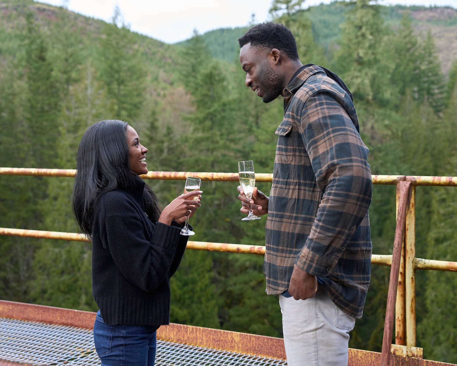 Charity Lawson and Dotun standing and talking in 'The Bachelorette' 2023