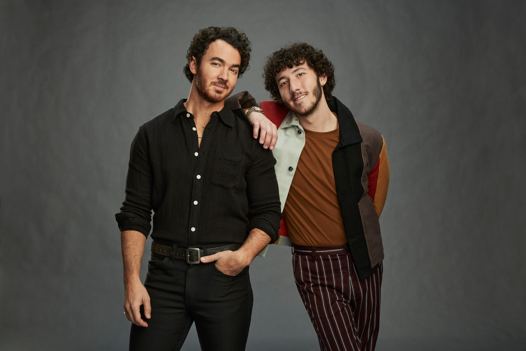 Kevin and Franklin Jonas from 'Claim to Fame' Season 2 leaning on each other