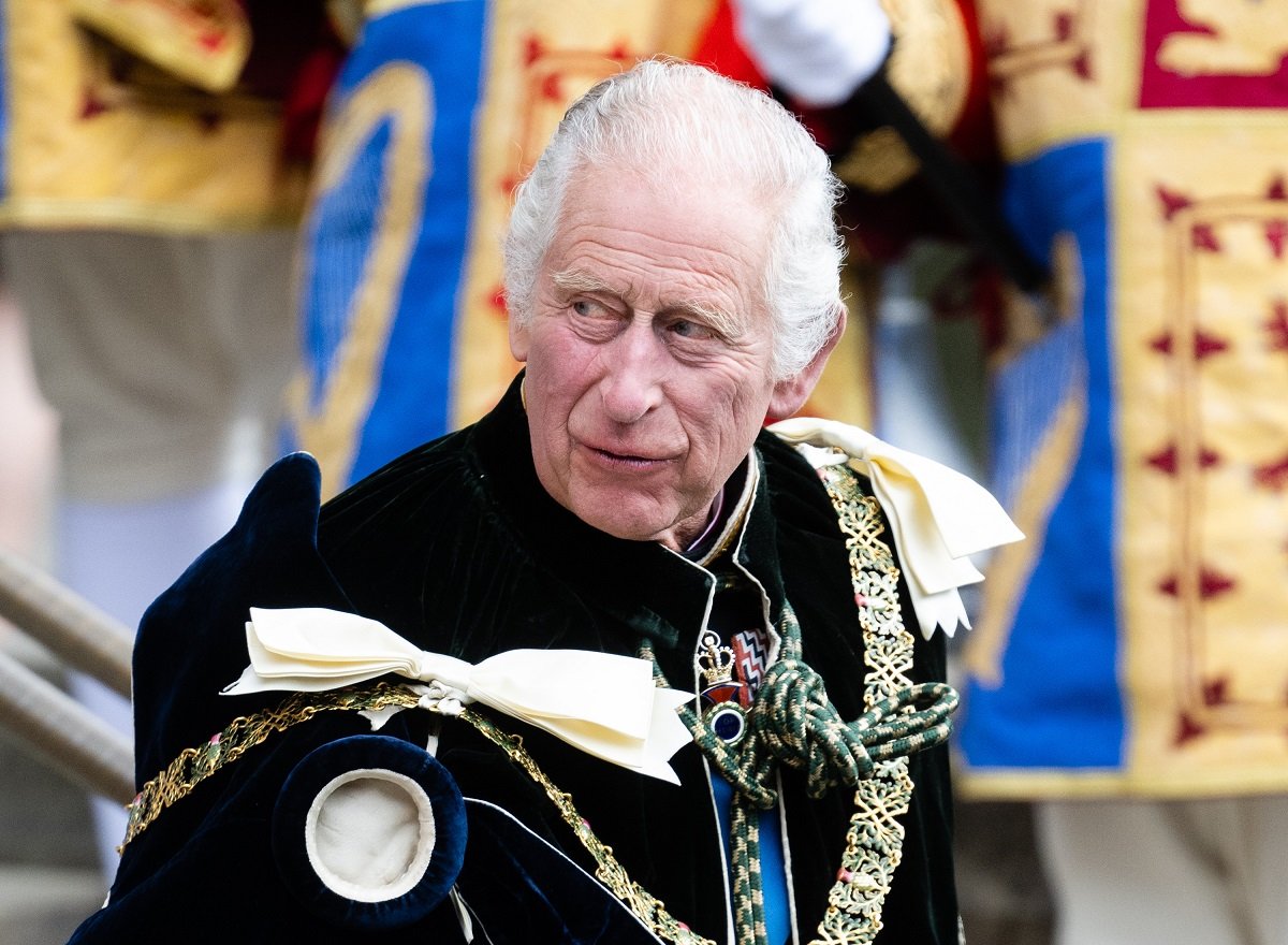 King Charles III, whose former valet says the monarch must have been thinking about Queen Elizabeth during Scottish coronation, leaves a service and dedication to coronation in Edinburgh