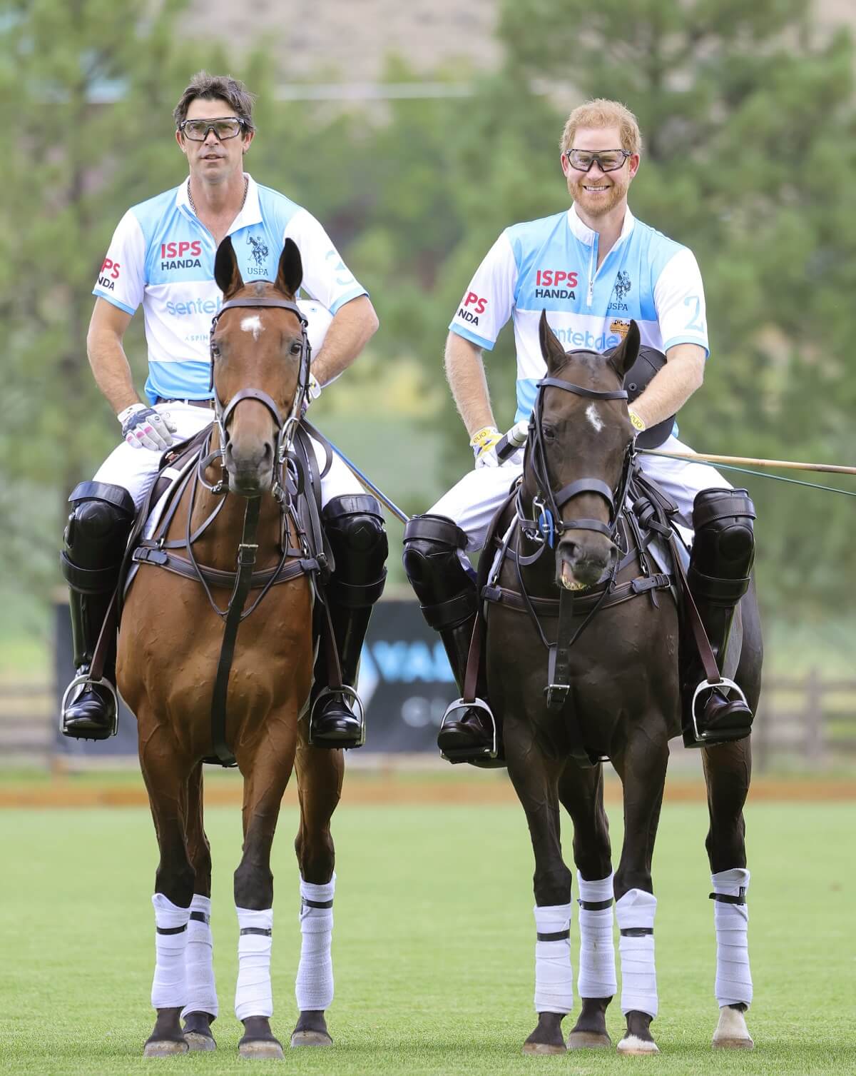 Nacho Figueras and Prince Harry play polo during the Sentebale ISPS Handa Polo Cup 2022