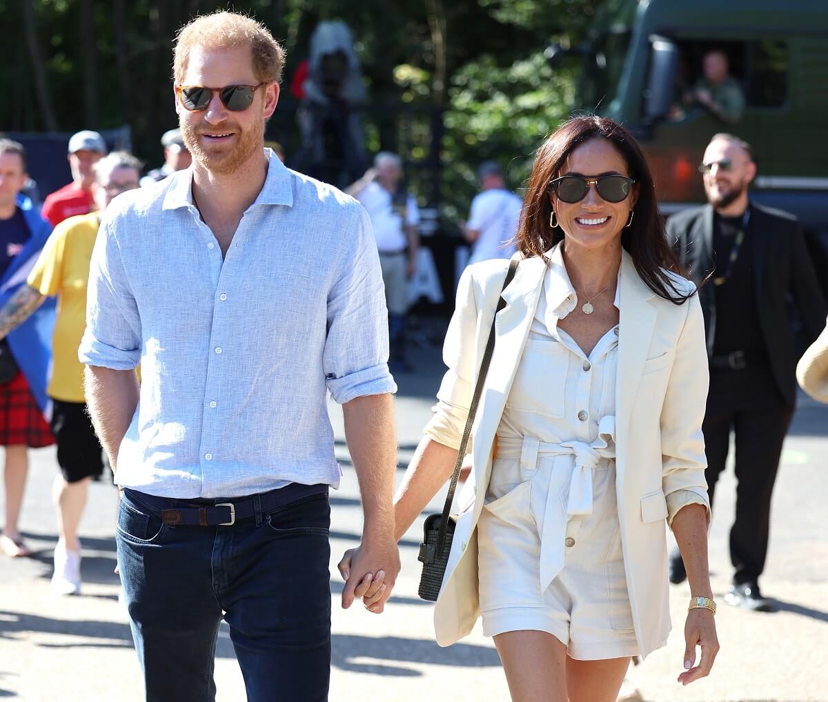 Prince Harry and Meghan Markle attend the cycling medal ceremony during Invictus Games