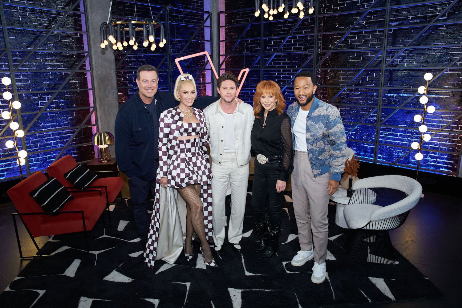 The Voice' Season 24 judges standing together and smiling