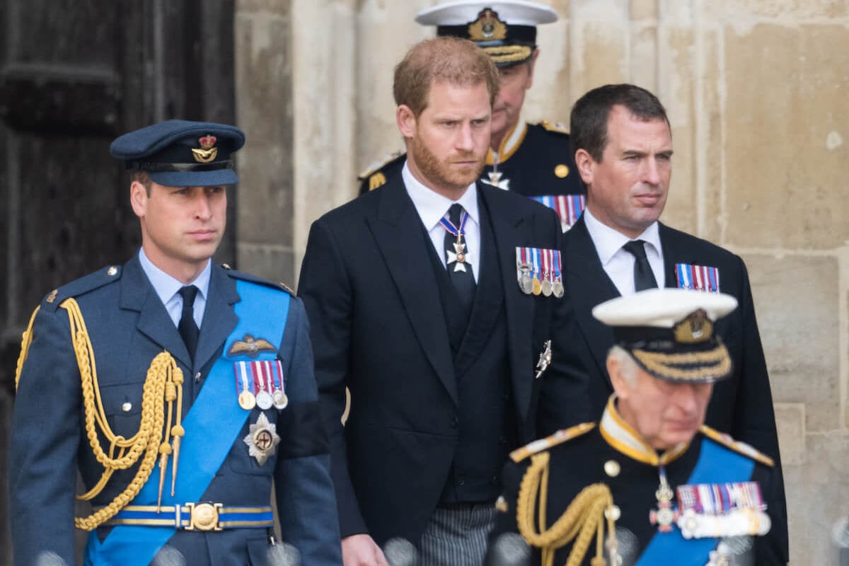 King Charles, who wants to 'hit the reset button,' walks ahead of Prince William, Prince Harry, and Peter Phillips