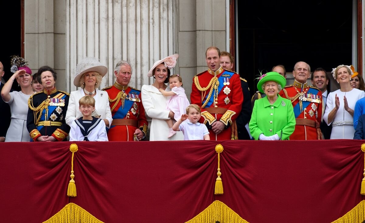 Members of the royal family including Zara Tindall, who a former employee says won't step up role within the family because it's 'not her thing,' watch a flypast during the Trooping the Colour
