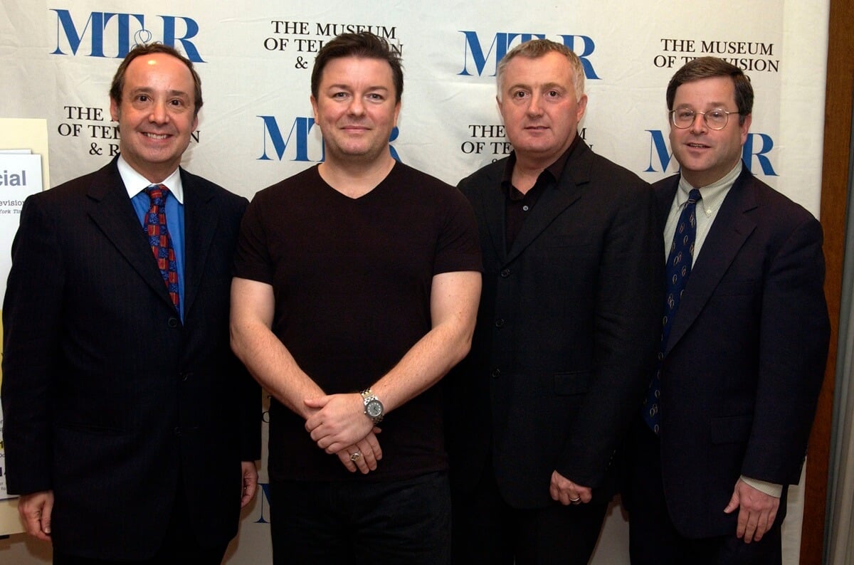 Ricky Gervais posing with Radio President Stuart Brothman, Senior television critic for TV Guide Matt Roush and President and CEO of BBC America Bill Hilary at the premiere of 'The Office Special'.