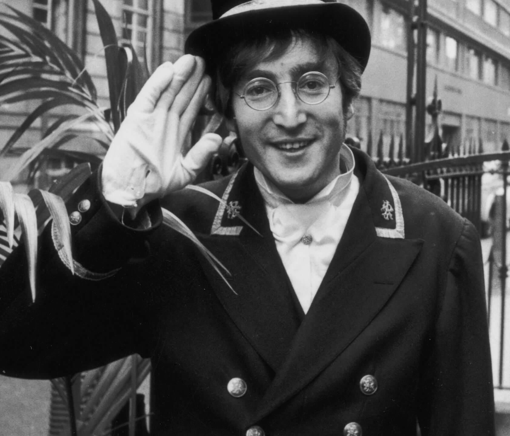 John Lennon saluting the viewer
