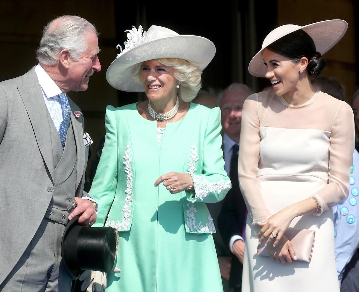 King Charles, Camilla Parker Bowles, and Meghan Markle