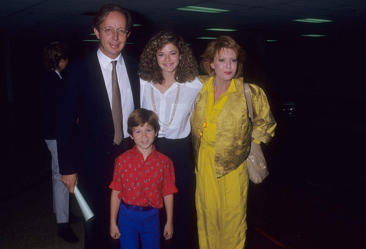 Actor Max Wright, Andrea Elson, Anne Schedeen, and Benji Gregory smile for a photo at the 1987 NBC Television Affiliates Party