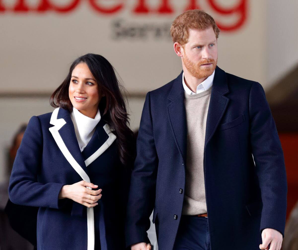 Meghan Markle and Prince Harry depart after visiting Nechells Wellbeing Centre in Birmingham, England