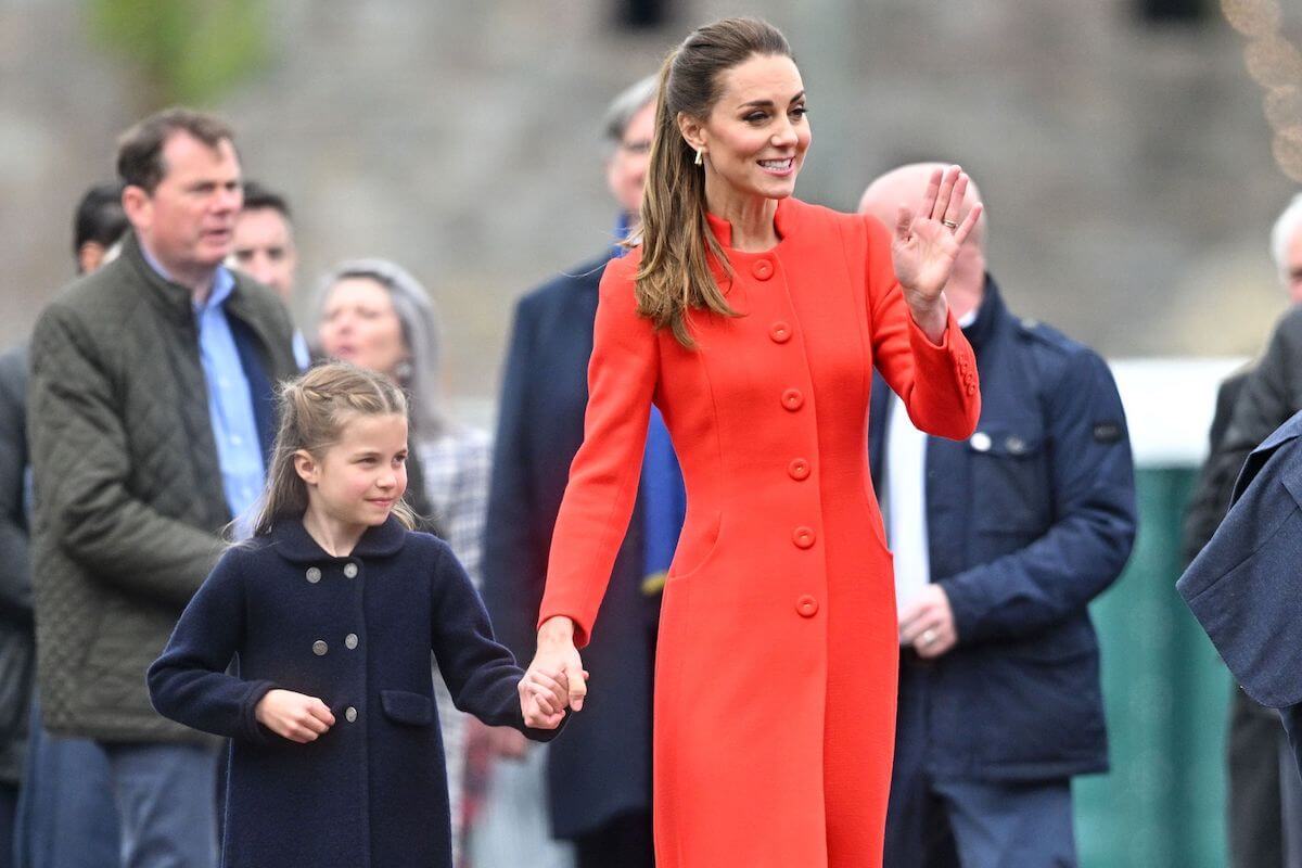 Princess Charlotte, who Kate Middleton worries about being an only daughter, hold hands