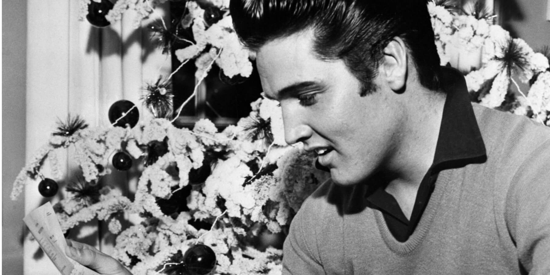 Elvis Presley photographed at home in Graceland during Christmas time.