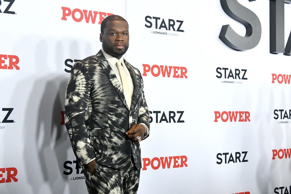 50 Cent posing in a suit at the premiere of 'Power'.
