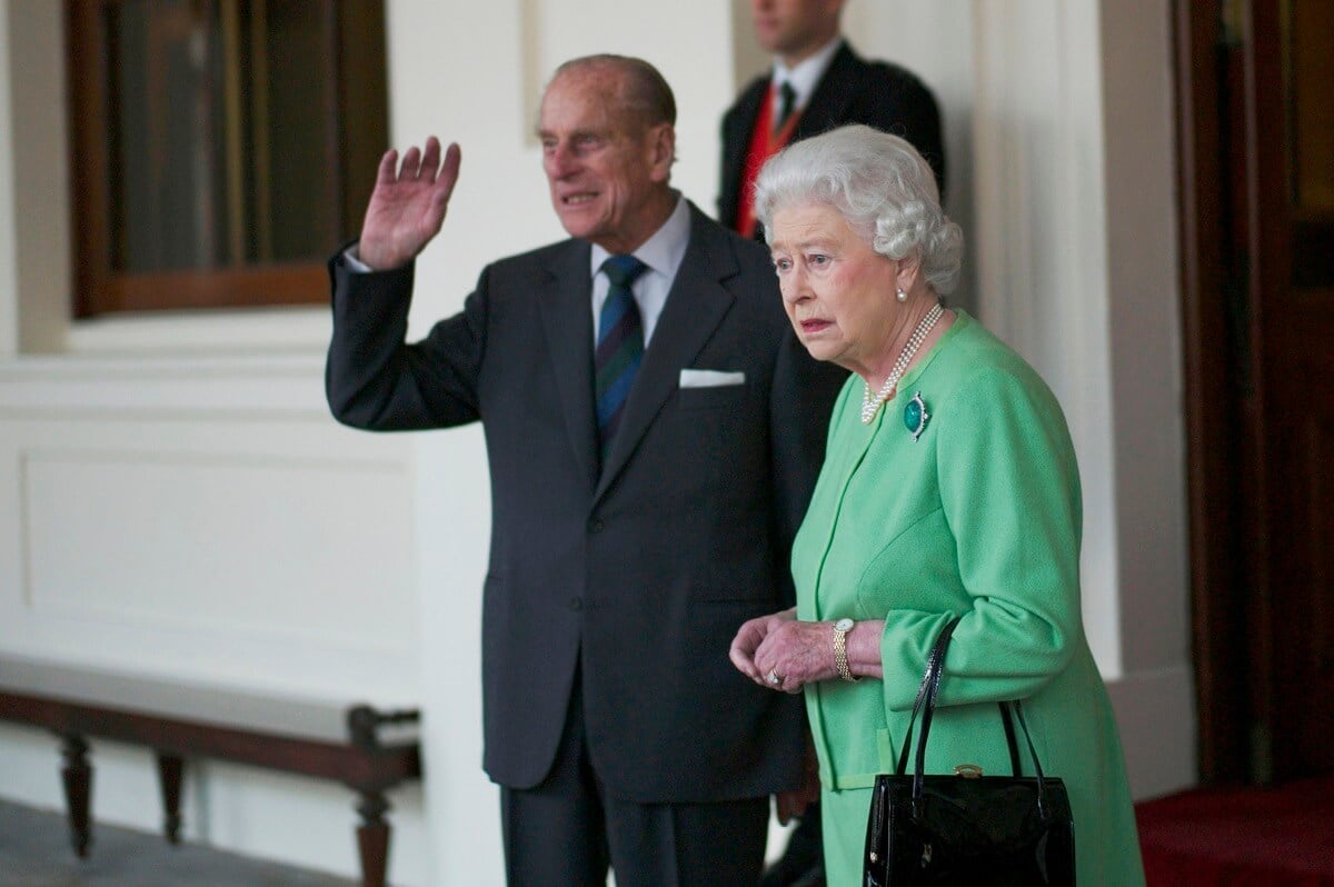 Prince Philip and Queen Elizabeth II pictured at Buckingham Palace after saying goodbye to former Turkish President Dr. Abdullah Gul and his wife, Hayrunnisa Gul