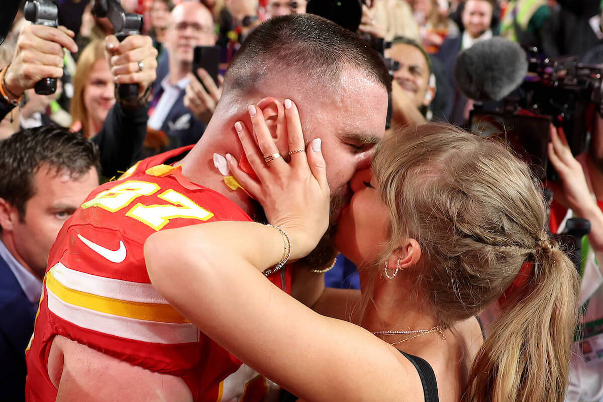 Travis Kelce and Taylor Swift kiss after the Chiefs 2024 Super Bowl win