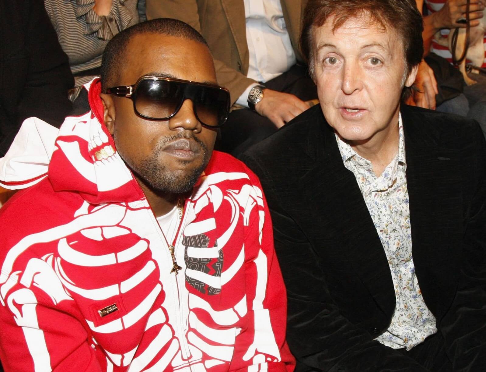 Kanye West sitting by The Beatles' Paul McCartney