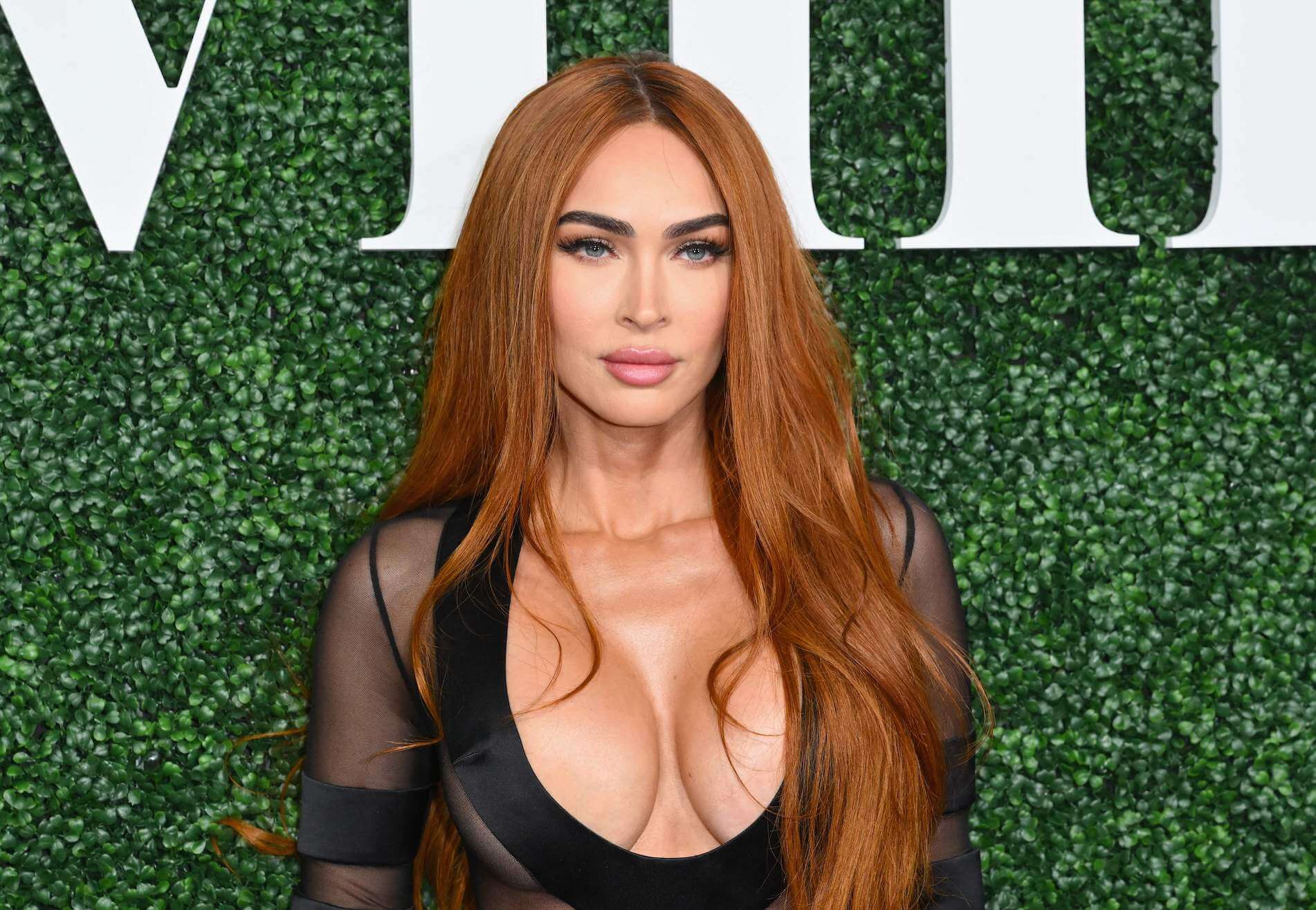 A close-up of Megan Fox at a Sports Illustrated event