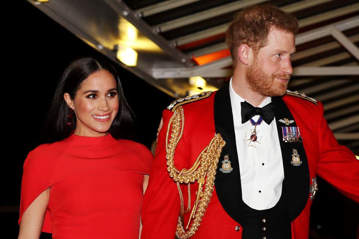 Meghan Markle and Prince Harry arrive to attend the Mountbatten Music Festival in London